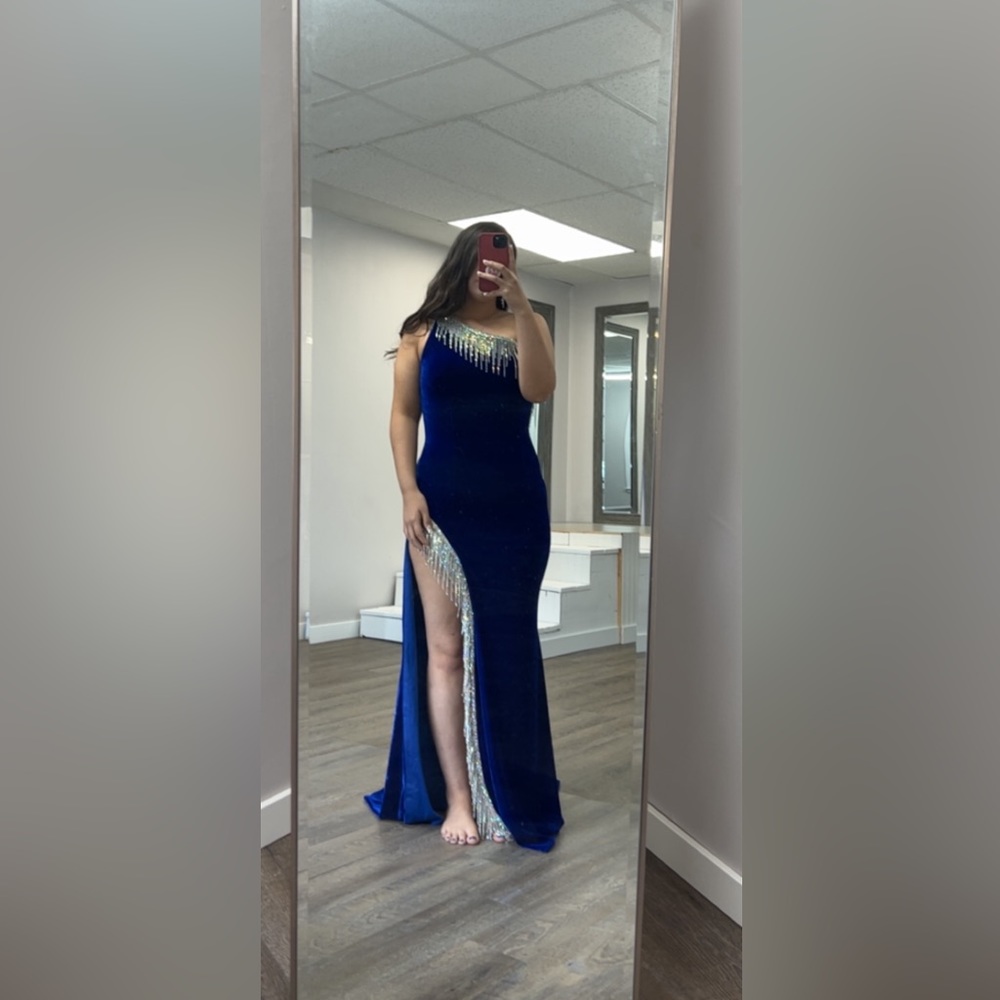 Beautiful royal blue velvet Johnathan kayne dress with fringe and high slit.